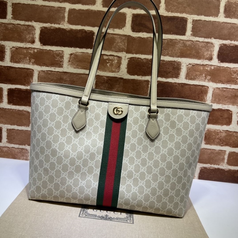 G*u*i shopping bags